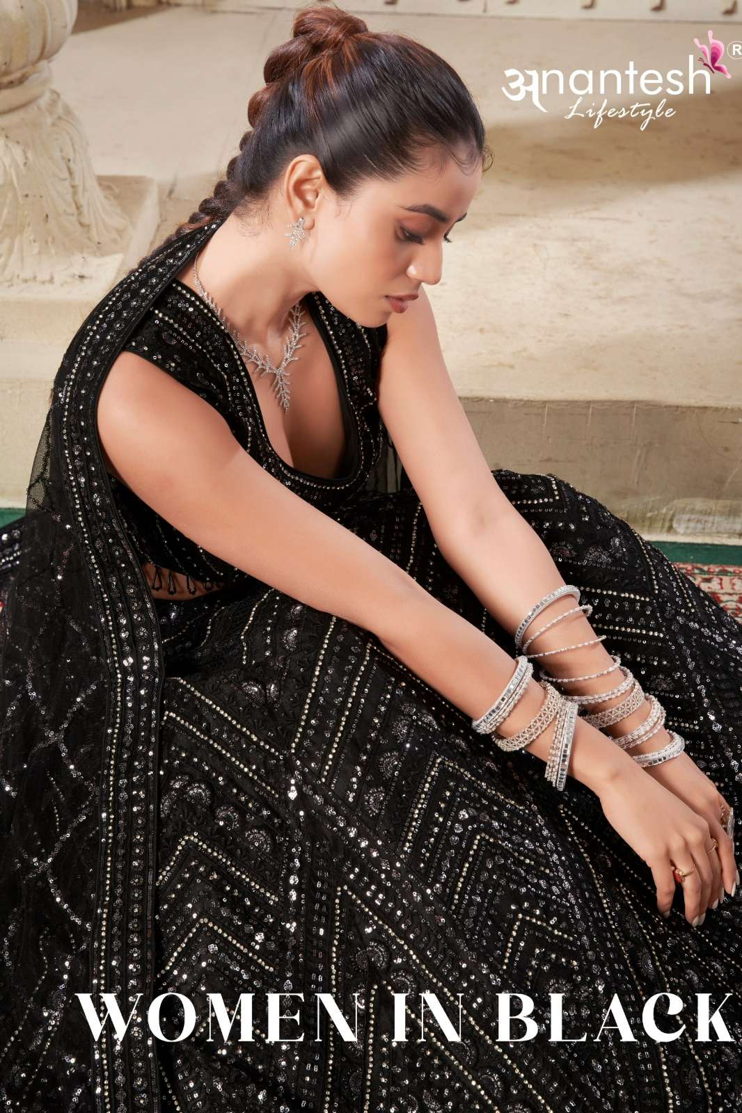ANANTESH WOMEN IN BLACK PARTY WEAR PREMIUM NET LEHENGA CHOLI