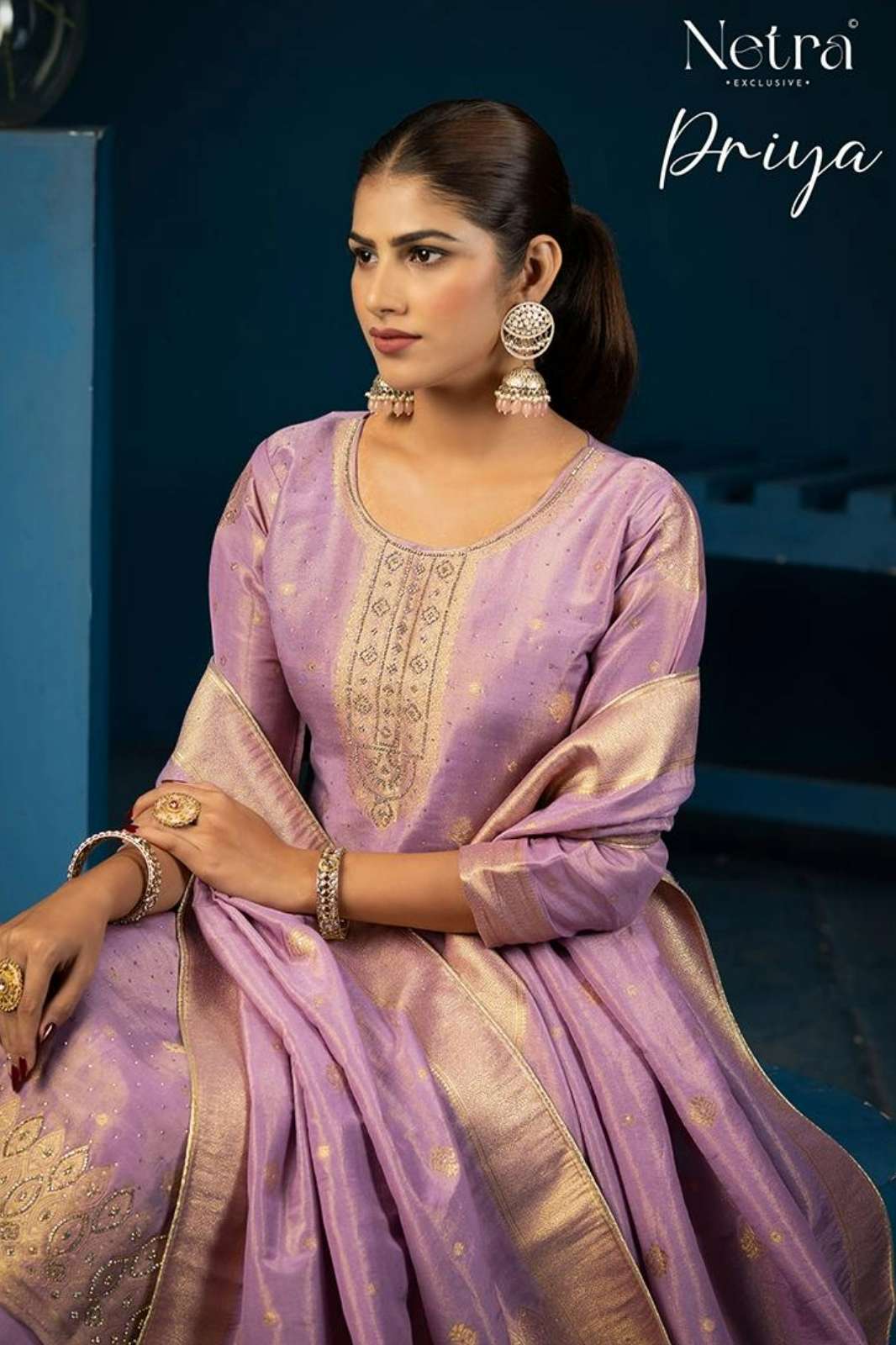 NETRA PRIYA URE SIMMER SILK BACK & SLEEVE SUIT WITH ZARKAN DIAMOND WORK 