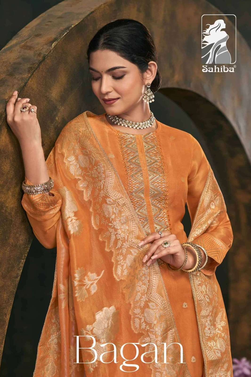 SAHIBA BAGAN EXCLUSIVE SIMMER JAQUARD DYED WITH EMBROIDERY AND HAND WORK