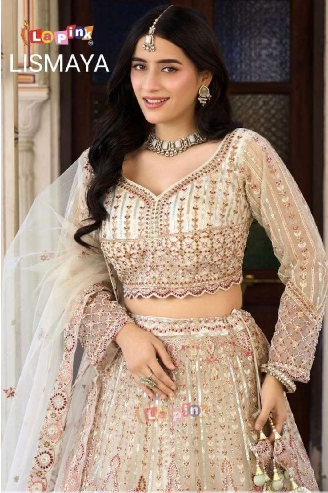 SHRI BALAAJI LAUNCHES LAPINK LISMAYA BEAUTIFUL OVERALL EMBROIDERED NET FABRIC READY TO WEAR LEHENGA