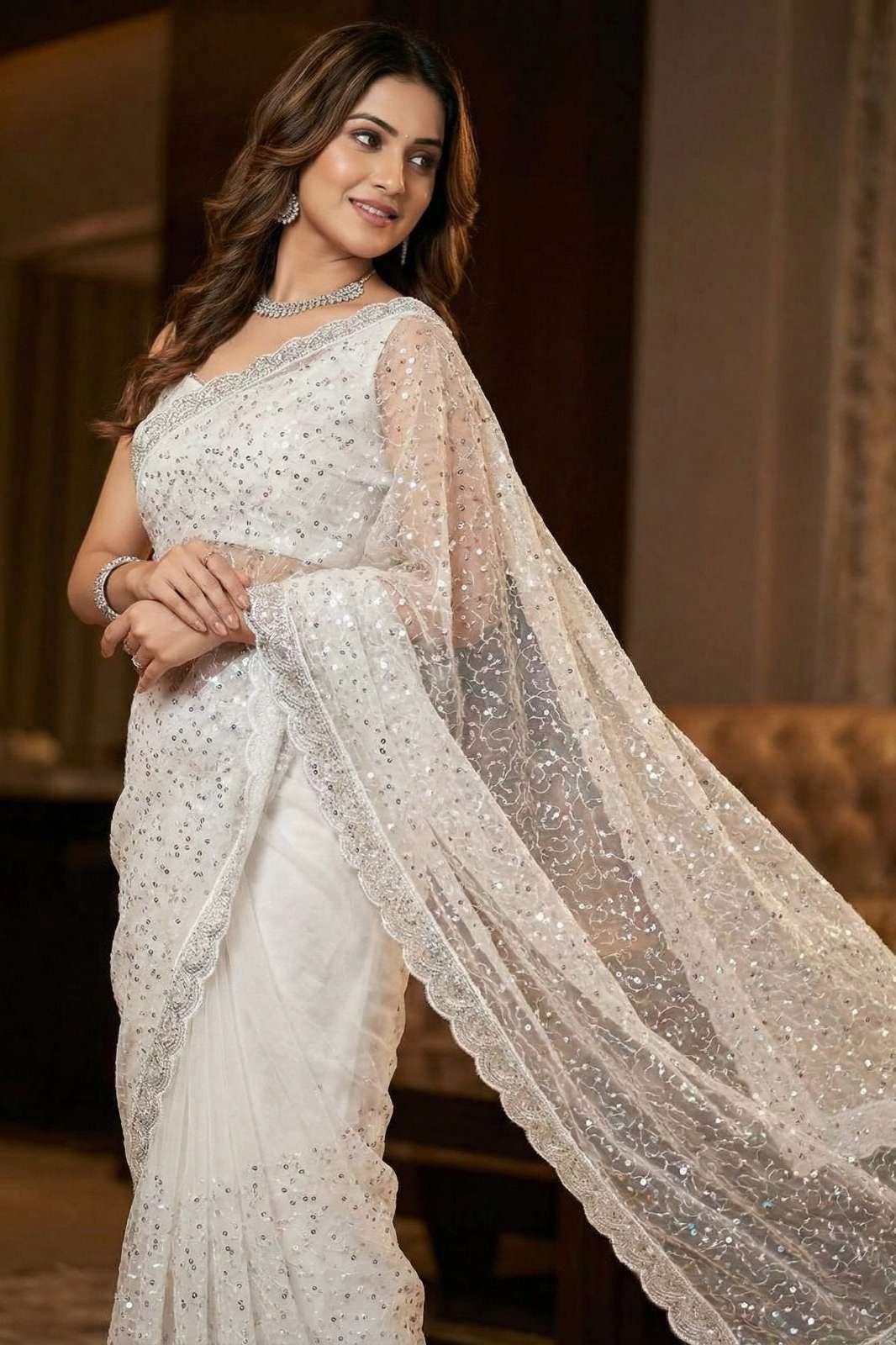 Shri Balaji Emporium Presents NAAZ PURE SOFT NET FABRIC HEAVY BEADS AND CUT WORK BORDER SAREE COLLECTION