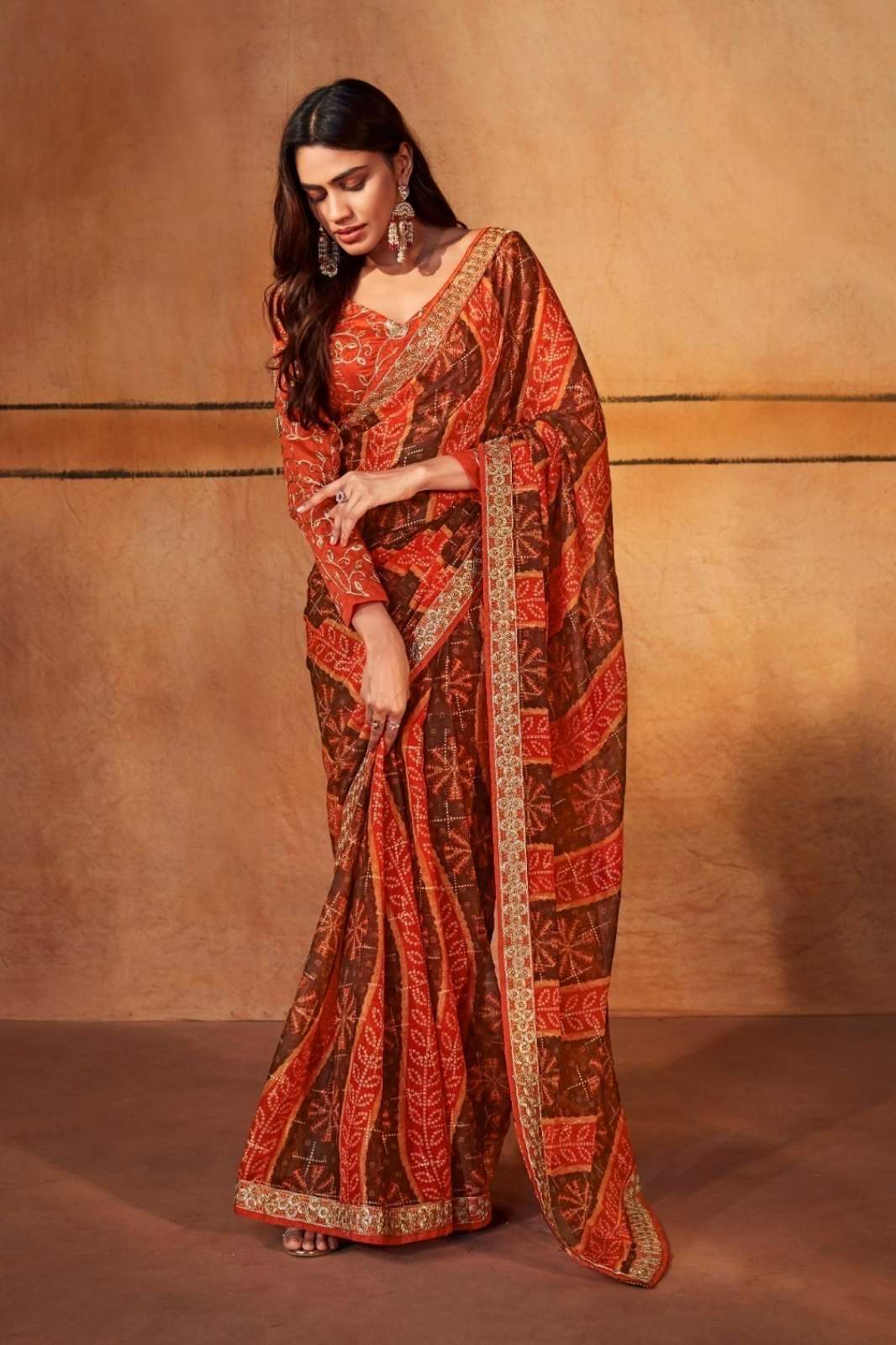 STAVAN Presents Gerua Pure Chiffon Saree with Embroidery Border and Embroided Blouse 