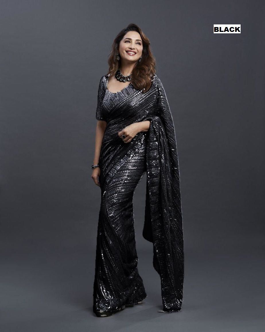 Judge Madhuri Dixit looks gorgeous in black saree as she strikes a pose on  the sets of dance reality show 'Dance Deewane' - Photogallery